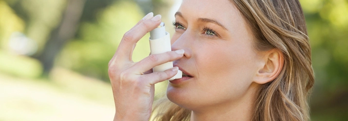 Chiropractic Wayland MI Woman With Inhaler